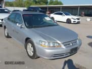 ✅ 2002 Honda Accord EX • VIN: 1HGCG16502A054138 • Lot: 43362519. Listed on IAAI with 157,849 mi. Free auction sales archive from the USA and detailed vehicle history report at DreamBid. Image 1.