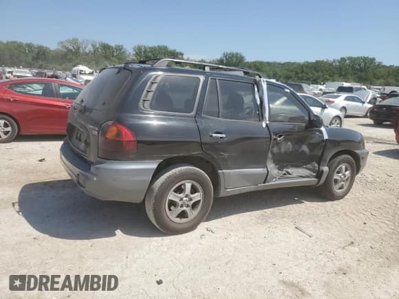 ✅ 2004 Hyundai Santa Fe GLS • VIN: KM8SC13E24U667076 • Lot: 69089595. Listed on Copart with 203,786 mi. Free auction sales archive from the USA and detailed vehicle history report at DreamBid. Image 3.