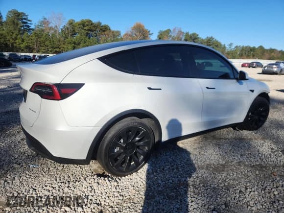 ✅ 2022 Tesla Model Y Long Range • VIN: 7SAYGDEE4NA013479 • Lot: 92576225. Listed on Copart with 24,830 mi. Free auction sales archive from the USA and detailed vehicle history report at DreamBid. Image 3.