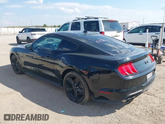 ✅ 2023 Ford Mustang GT • VIN: 1FA6P8CF3P5303958 • Lot: 43230140. Wystawiony na IAAI z przebiegiem 38 669 mil. Bezpłatny archiwum sprzedaży aukcyjnych z USA i szczegółowy raport historii pojazdu na DreamBid. Zdjęcie 3.