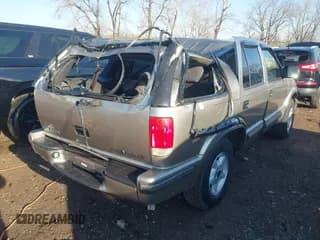 ✅ 1999 Chevrolet Blazer LT • VIN: 1GNDT13W9X2186755 • Lot: 41865171. Wystawiony na IAAI z przebiegiem 107 191 mil. Bezpłatny archiwum sprzedaży aukcyjnych z USA i szczegółowy raport historii pojazdu na DreamBid. Zdjęcie 4.