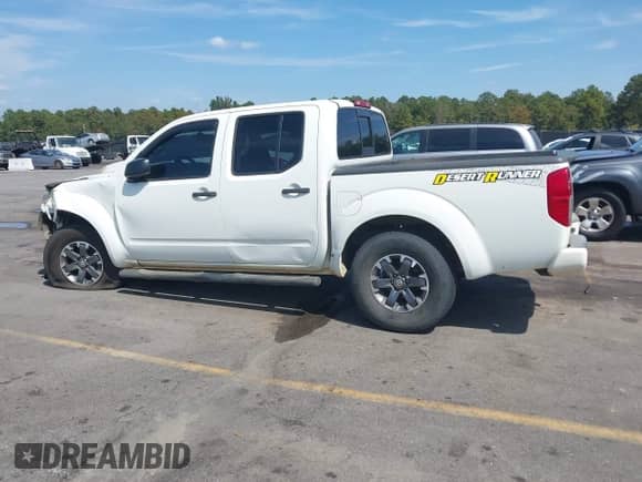 2014 Nissan Frontier Desert Runner z VIN 1N6AD0ER1EN768304, wystawiony jako IAAI lot #43281195 z przebiegiem 115 362 mil mil oraz . Historia ofert i sprzedaży dostępna na DreamBid. Obrazek 15.