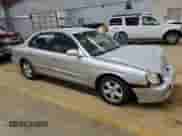 2000 Hyundai Sonata GL with VIN KMHWF25S2YA301983, listed as a Copart auction lot 86840554 with 104,780 mi miles and Salvage title. Bid and sale history available at DreamBid. Image 4.