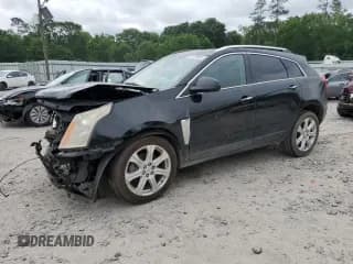 ✅ 2014 Cadillac SRX Performance Collection • VIN: 3GYFNCE30ES642762 • Lot: 54179995. Listed on Copart with 120,623 mi. Free auction sales archive from the USA and detailed vehicle history report at DreamBid. Image 1.