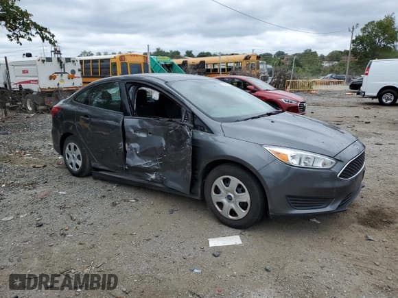 ✅ 2018 Ford Focus S • VIN: 1FADP3E23JL319942 • Lot: 71437035. Listed on Copart with 96,831 mi. Free auction sales archive from the USA and detailed vehicle history report at DreamBid. Image 4.