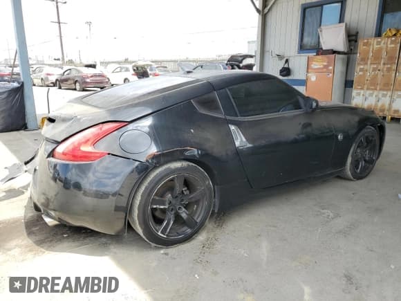✅ 2009 Nissan 370Z Touring • VIN: JN1AZ44E59M401771 • Lot: 71959725. Listed on Copart with 85,677 mi. Free auction sales archive from the USA and detailed vehicle history report at DreamBid. Image 3.