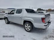 ✅ 2014 Honda Ridgeline RTL • VIN: 5FPYK1F55EB501150 • Лот: 94868125. Опубликован ранее на Copart с пробегом 265 217 миль. Бесплатный доступ к архиву аукционных продаж из США и подробный отчёт об истории автомобиля на DreamBid. Изображение 2.