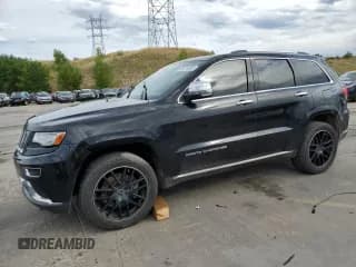 ✅ 2014 Jeep Grand Cherokee Summit • VIN: 1C4RJFJM6EC538717 • Lot: 66514065. Listed on Copart with 184,969 mi. Free auction sales archive from the USA and detailed vehicle history report at DreamBid. Image 1.