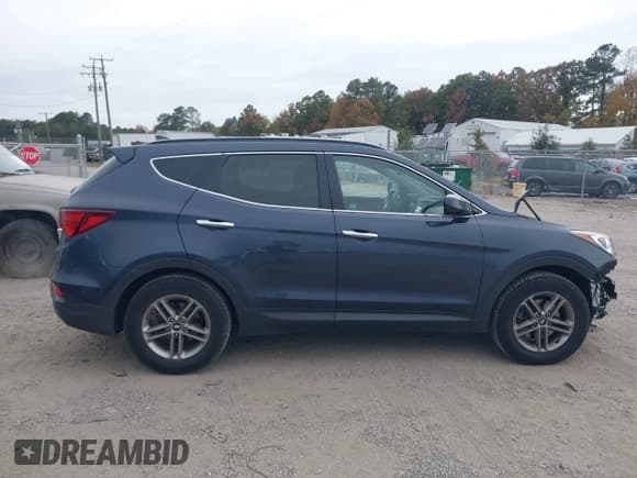 ✅ 2017 Hyundai Santa Fe 2.4L • VIN: 5NMZU3LB6HH027984 • Lot: 43505016. Listed on IAAI with 138,308 mi. Free auction sales archive from the USA and detailed vehicle history report at DreamBid. Image 13.