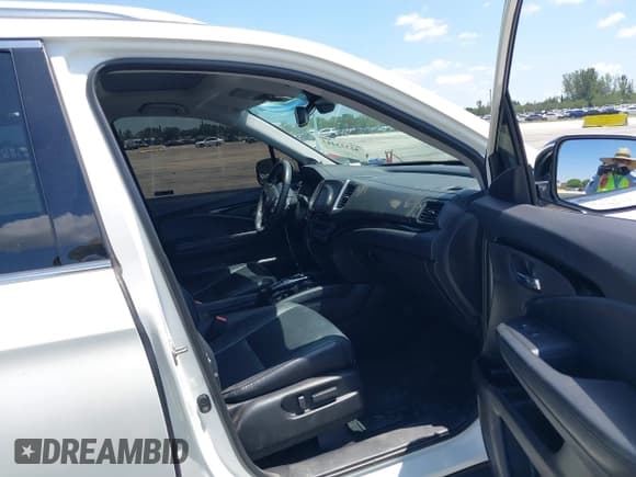 ✅ 2018 Honda Pilot Elite • VIN: 5FNYF6H00JB058623 • Lot: 42323415. Listed on IAAI with 102,015 mi. Free auction sales archive from the USA and detailed vehicle history report at DreamBid. Image 5.