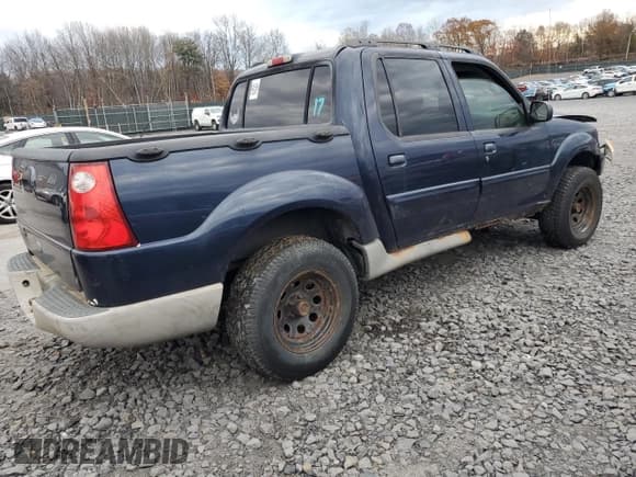 ✅ 2003 Ford Explorer Sport Trac XLS • VIN: 1FMZU77E13UB07895 • Lot: 90637575. Listed on Copart with 203,918 mi. Free auction sales archive from the USA and detailed vehicle history report at DreamBid. Image 3.