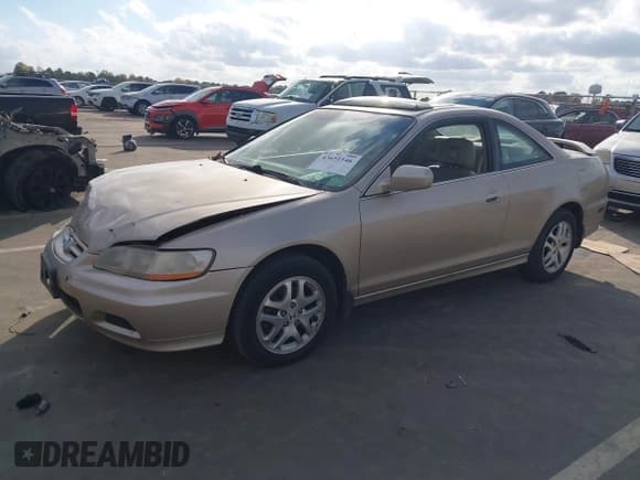 ✅ 2001 Honda Accord EX • VIN: 1HGCG225X1A000596 • Lot: 43651546. Listed on IAAI with 123,073 mi. Free auction sales archive from the USA and detailed vehicle history report at DreamBid. Image 2.