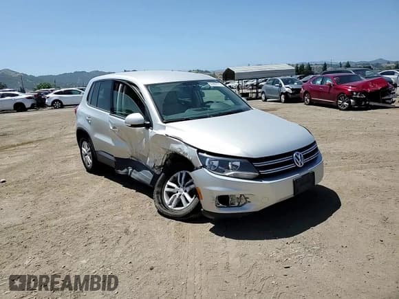 ✅ 2012 Volkswagen Tiguan LE • VIN: WVGAV7AX8CW568651 • Lot: 55969775. Listed on Copart with 113,503 mi. Free auction sales archive from the USA and detailed vehicle history report at DreamBid. Image 14.
