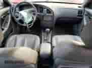 2004 Hyundai Elantra GT z VIN KMHDN56D34U104583, wystawiony jako Copart lot #82441094 z przebiegiem Nie podano mil oraz Szkoda całkowita • Salvage title. Historia ofert i sprzedaży dostępna na DreamBid. Obrazek 8.