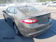 ✅ 2015 Ford Fusion Titanium • VIN: 3FA6P0SU8FR243611 • Lot: 43169838. Wystawiony na IAAI z przebiegiem 131 248 mil. Bezpłatny archiwum sprzedaży aukcyjnych z USA i szczegółowy raport historii pojazdu na DreamBid. Zdjęcie 3.