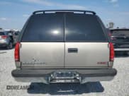 ✅ 1999 GMC Suburban • VIN: 1GKEC16R2XJ700510 • Лот: 45296135. Опубликован ранее на Copart с пробегом 189 004 миль. Бесплатный доступ к архиву аукционных продаж из США и подробный отчёт об истории автомобиля на DreamBid. Изображение 6.