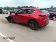 ✅ 2021 Mazda CX-5 Touring • VIN: JM3KFBCMXM1303358 • Lot: 42829675. Wystawiony na IAAI z przebiegiem 53 848 mil. Bezpłatny archiwum sprzedaży aukcyjnych z USA i szczegółowy raport historii pojazdu na DreamBid. Zdjęcie 3.