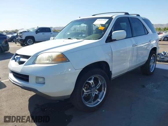 ✅ 2004 Acura MDX Touring • VIN: 2HNYD18844H557819 • Lot: 42855324. Wystawiony na IAAI z przebiegiem 165 576 mil. Bezpłatny archiwum sprzedaży aukcyjnych z USA i szczegółowy raport historii pojazdu na DreamBid. Zdjęcie 2.