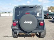 ✅ 2002 Jeep Wrangler Sahara • VIN: 1J4FA59S62P756767 • Lot: 43730556. Listed on IAAI with 145,681 mi. Free auction sales archive from the USA and detailed vehicle history report at DreamBid. Image 17.