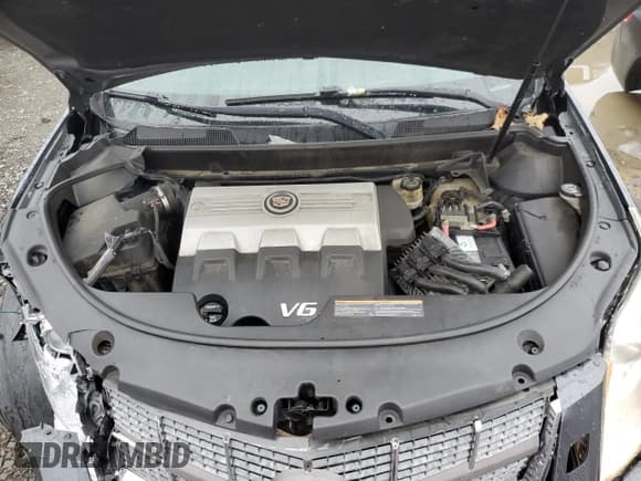 ✅ 2010 Cadillac SRX Premium Collection • VIN: 3GYFNFEY2AS606370 • Lot: 83405774. Wystawiony na Copart z przebiegiem 164 238 mil. Bezpłatny archiwum sprzedaży aukcyjnych z USA i szczegółowy raport historii pojazdu na DreamBid. Zdjęcie 12.