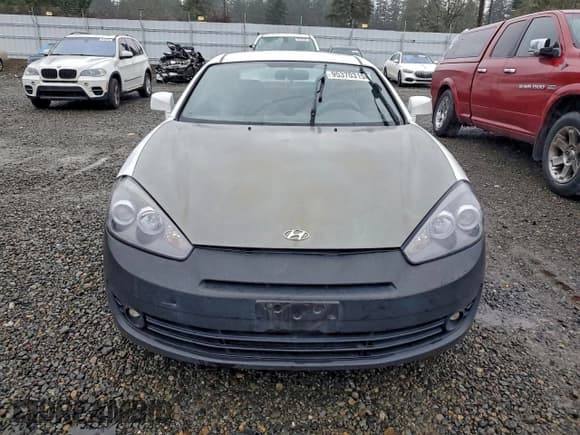 ✅ 2008 Hyundai Tiburon GS • VIN: KMHHM66DX8U290039 • Лот: 95370315. Опубликован ранее на Copart с пробегом 130 680 миль. Бесплатный доступ к архиву аукционных продаж из США и подробный отчёт об истории автомобиля на DreamBid. Изображение 5.