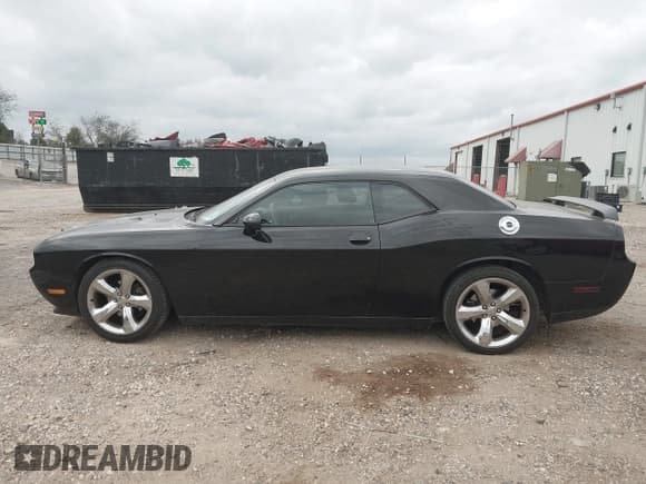 ✅ 2013 Dodge Challenger SXT • VIN: 2C3CDYAG3DH530898 • Lot: 43736090. Listed on IAAI with 184,353 mi. Free auction sales archive from the USA and detailed vehicle history report at DreamBid. Image 14.