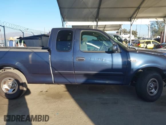 ✅ 2003 Ford F-150 XL • VIN: 2FTRX17243CB00969 • Lot: 43492982. Listed on IAAI with 400,470 mi. Free auction sales archive from the USA and detailed vehicle history report at DreamBid. Image 13.