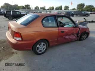 2000 Hyundai Accent z VIN KMHCG35G7YU033965, wystawiony jako Copart lot #82433065 z przebiegiem 111 729 mil mil oraz Szkoda całkowita • Salvage title. Historia ofert i sprzedaży dostępna na DreamBid. Obrazek 3.