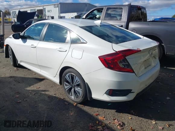 ✅ 2017 Honda Civic EX-T • VIN: 19XFC1F3XHE020963 • Лот: 43646572. Опубликован ранее на IAAI с пробегом 94 379 миль. Бесплатный доступ к архиву аукционных продаж из США и подробный отчёт об истории автомобиля на DreamBid. Изображение 3.