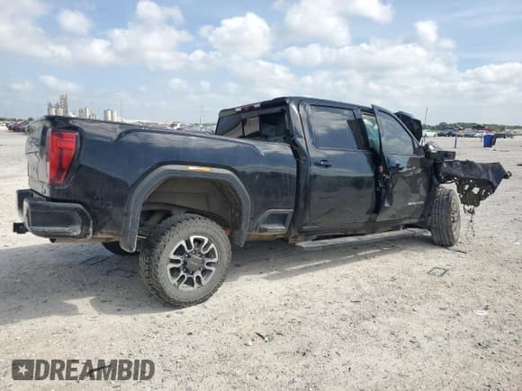 ✅ 2021 GMC Sierra 3500HD AT4 • VIN: 1GT49VEY0MF254801 • Лот: 62000004. Опубликован ранее на Copart с пробегом Не указан. Бесплатный доступ к архиву аукционных продаж из США и подробный отчёт об истории автомобиля на DreamBid. Изображение 3.