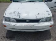 ✅ 1993 Toyota Corolla • VIN: 1NXAE04E9PZ113388 • Lot: 42556633. Listed on IAAI with 130,024 mi. Free auction sales archive from the USA and detailed vehicle history report at DreamBid. Image 6.