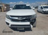 ✅ 2020 Chevrolet Colorado 4WD LT • VIN: 1GCHTCEA6L1163215 • Lot: 43206313. Listed on IAAI with 144,189 mi. Free auction sales archive from the USA and detailed vehicle history report at DreamBid. Image 12.