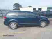 2015 Dodge Journey American Value z VIN 3C4PDCABXFT610861, wystawiony jako IAAI lot #43068421 z przebiegiem 153 937 mil mil oraz . Historia ofert i sprzedaży dostępna na DreamBid. Obrazek 13.