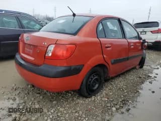 ✅ 2006 Kia Rio • VIN: KNADE123166070450 • Lot: 39369374. Listed on Copart with Not provided. Free auction sales archive from the USA and detailed vehicle history report at DreamBid. Image 3.