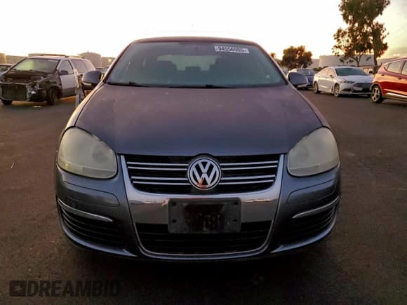 ✅ 2009 Volkswagen Jetta S • VIN: 3VWJZ71K29M019885 • Lot: 94556905. Listed on Copart with 127,645 mi. Free auction sales archive from the USA and detailed vehicle history report at DreamBid. Image 5.