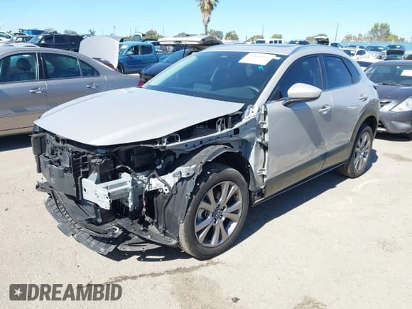 ✅ 2024 Mazda CX-30 S Preferred • VIN: 3MVDMBCM0RM718429 • Lot: 43461659. Listed on IAAI with 7,309 mi. Free auction sales archive from the USA and detailed vehicle history report at DreamBid. Image 18.
