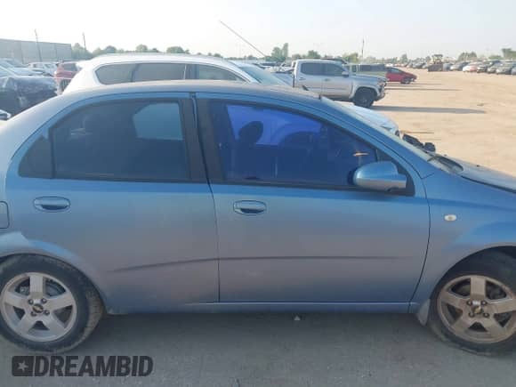 2006 Chevrolet Aveo LT z VIN KL1TG56666B600429, wystawiony jako IAAI lot #43103604 z przebiegiem 83 477 mil mil oraz . Historia ofert i sprzedaży dostępna na DreamBid. Obrazek 13.