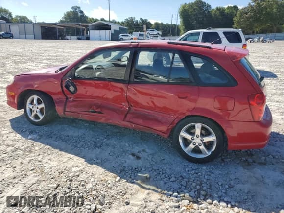 ✅ 2002 Mazda Protege • VIN: JM1BJ245021482277 • Лот: 65128655. Опубликован ранее на Copart с пробегом 256 093 миль. Бесплатный доступ к архиву аукционных продаж из США и подробный отчёт об истории автомобиля на DreamBid. Изображение 2.