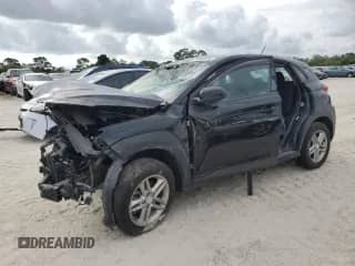 2018 Hyundai Kona SE z VIN KM8K12AAXJU179596, wystawiony jako Copart lot #80868124 z przebiegiem 65 023 mil mil oraz Nie do naprawy • Non repairable. Historia ofert i sprzedaży dostępna na DreamBid. Obrazek 1.