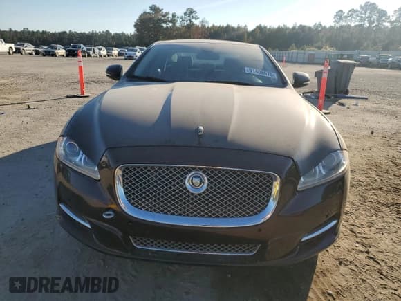 ✅ 2011 Jaguar XJ • VIN: SAJWA1CB6BLV06221 • Lot: 91406675. Listed on Copart with 106,240 mi. Free auction sales archive from the USA and detailed vehicle history report at DreamBid. Image 5.