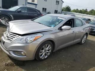2012 Hyundai Azera z VIN KMHFG4JG7CA158936, wystawiony jako Copart lot #81573525 z przebiegiem 110 617 mil mil oraz Szkoda całkowita • Salvage title. Historia ofert i sprzedaży dostępna na DreamBid. Obrazek 1.