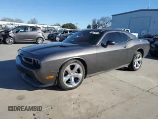 ✅ 2013 Dodge Challenger Rallye Redline • VIN: 2C3CDYAG4DH561982 • Lot: 46873885. Wystawiony na Copart z przebiegiem 125 691 mil. Bezpłatny archiwum sprzedaży aukcyjnych z USA i szczegółowy raport historii pojazdu na DreamBid. Zdjęcie 1.