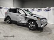 ✅ 2018 Toyota RAV4 XLE • VIN: 2T3RFREV6JW711939 • Лот: 80087645. Опубликован ранее на Copart с пробегом 125 220 миль. Бесплатный доступ к архиву аукционных продаж из США и подробный отчёт об истории автомобиля на DreamBid. Изображение 4.