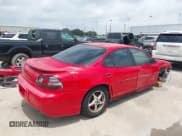 ✅ 1999 Pontiac Grand Prix GTP • VIN: 1G2WR5213XF339219 • Lot: 39839049. Listed on IAAI with 211,594 mi. Free auction sales archive from the USA and detailed vehicle history report at DreamBid. Image 4.