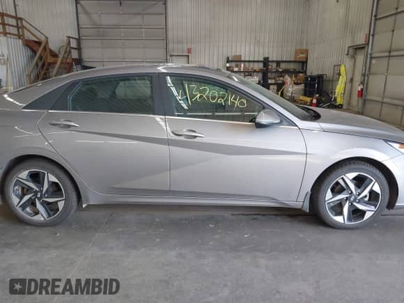 2023 Hyundai Elantra Limited z VIN KMHLN4AJ8PU051936, wystawiony jako IAAI lot #43202140 z przebiegiem 55 720 mil mil oraz . Historia ofert i sprzedaży dostępna na DreamBid. Obrazek 13.