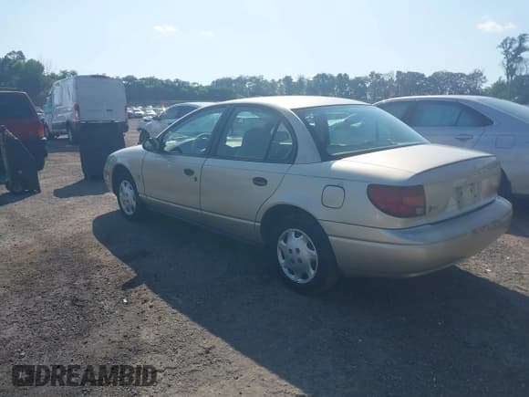 ✅ 2002 Saturn SL • VIN: 1G8ZH52812Z227514 • Lot: 42859934. Listed on IAAI with 84,221 mi. Free auction sales archive from the USA and detailed vehicle history report at DreamBid. Image 3.