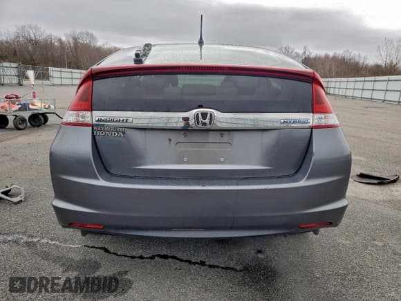 ✅ 2014 Honda Insight • VIN: JHMZE2H37ES002695 • Lot: 95284125. Listed on Copart with 122,869 mi. Free auction sales archive from the USA and detailed vehicle history report at DreamBid. Image 6.