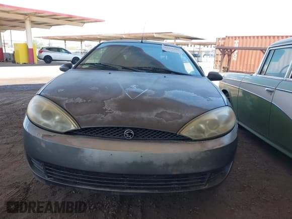 ✅ 2002 Mercury Cougar • VIN: 1ZWFT603925602182 • Лот: 42431599. Опубликован ранее на IAAI с пробегом 169 062 миль. Бесплатный доступ к архиву аукционных продаж из США и подробный отчёт об истории автомобиля на DreamBid. Изображение 6.