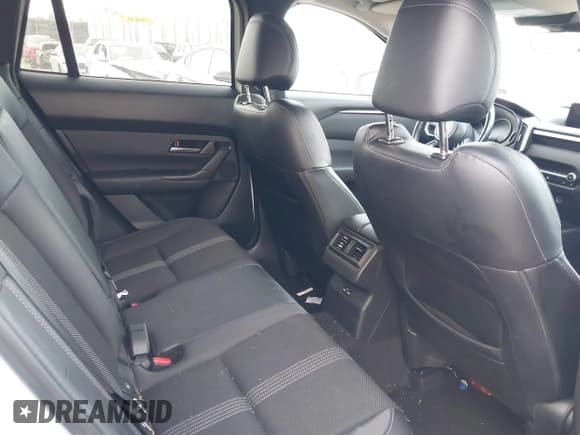 ✅ 2023 Mazda CX-50 S Preferred Plus • VIN: 7MMVABCM3PN133636 • Lot: 43424123. Listed on IAAI with 28,546 mi. Free auction sales archive from the USA and detailed vehicle history report at DreamBid. Image 8.