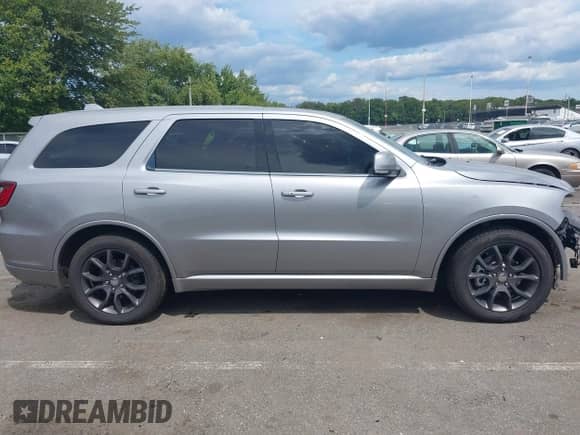 2017 Dodge Durango R/T with VIN 1C4SDJCT4HC606761, listed as a IAAI auction lot 43107117 with 87,878 mi miles and . Bid and sale history available at DreamBid. Image 13.
